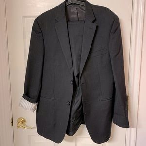 Two piece black suit.